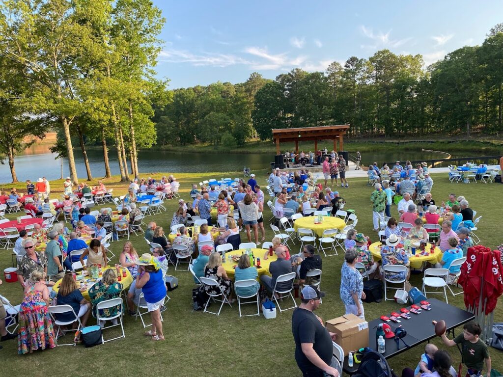 Cresswind Georgia at Twin Lakes outdoor concert featuring renowned Jimmy Buffett cover band, Sons of Sailors.